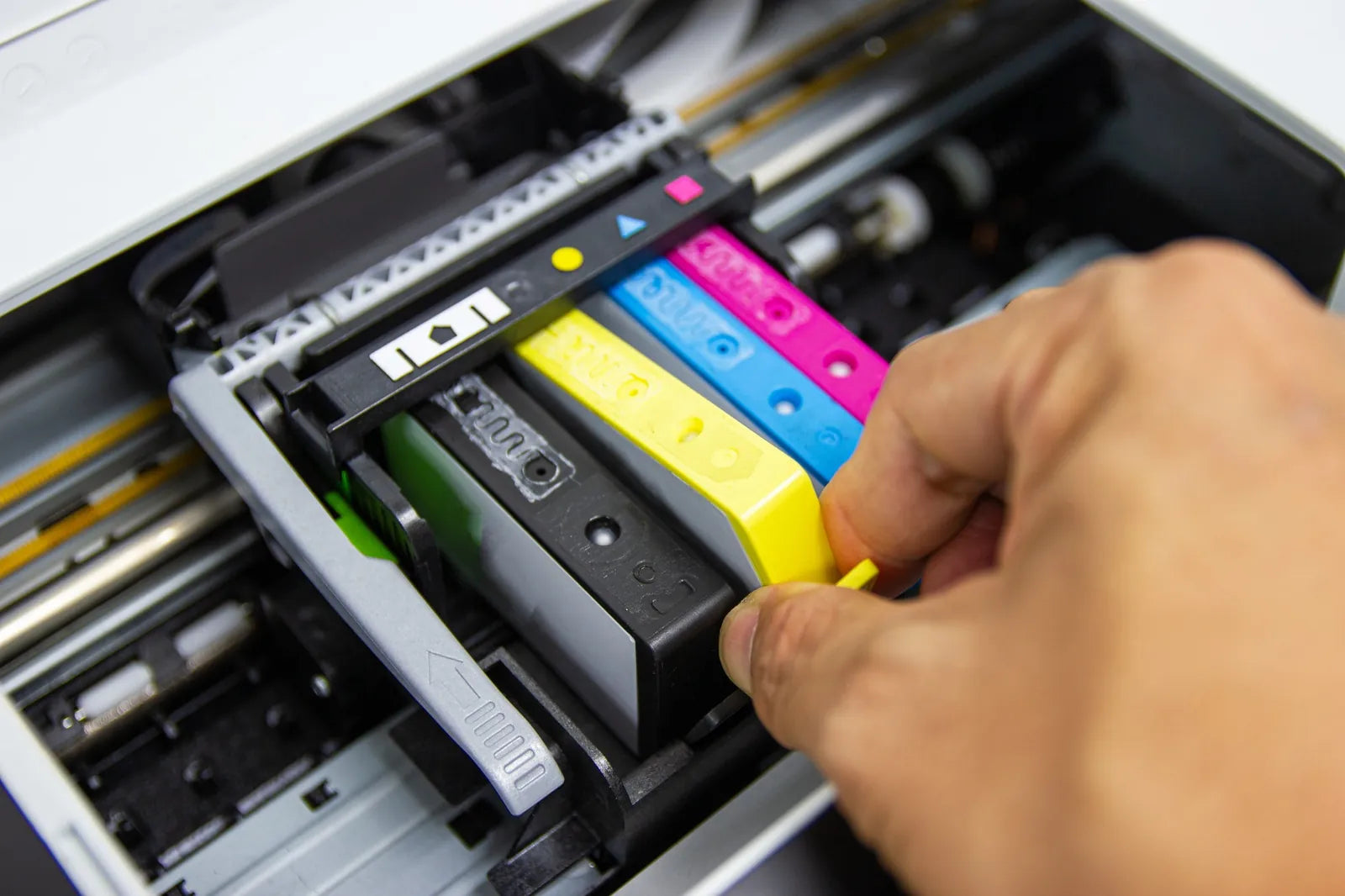 Installing a set of compatible colour cartridges into a printer